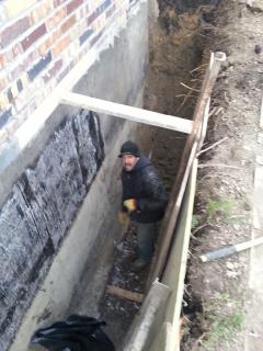 One of RD Constructions workers working on a foundation.