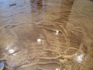 Metallic Expoxy design on a concrete floor.